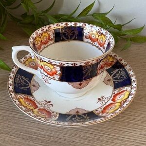 Vibrant Floral Teacup and Saucer